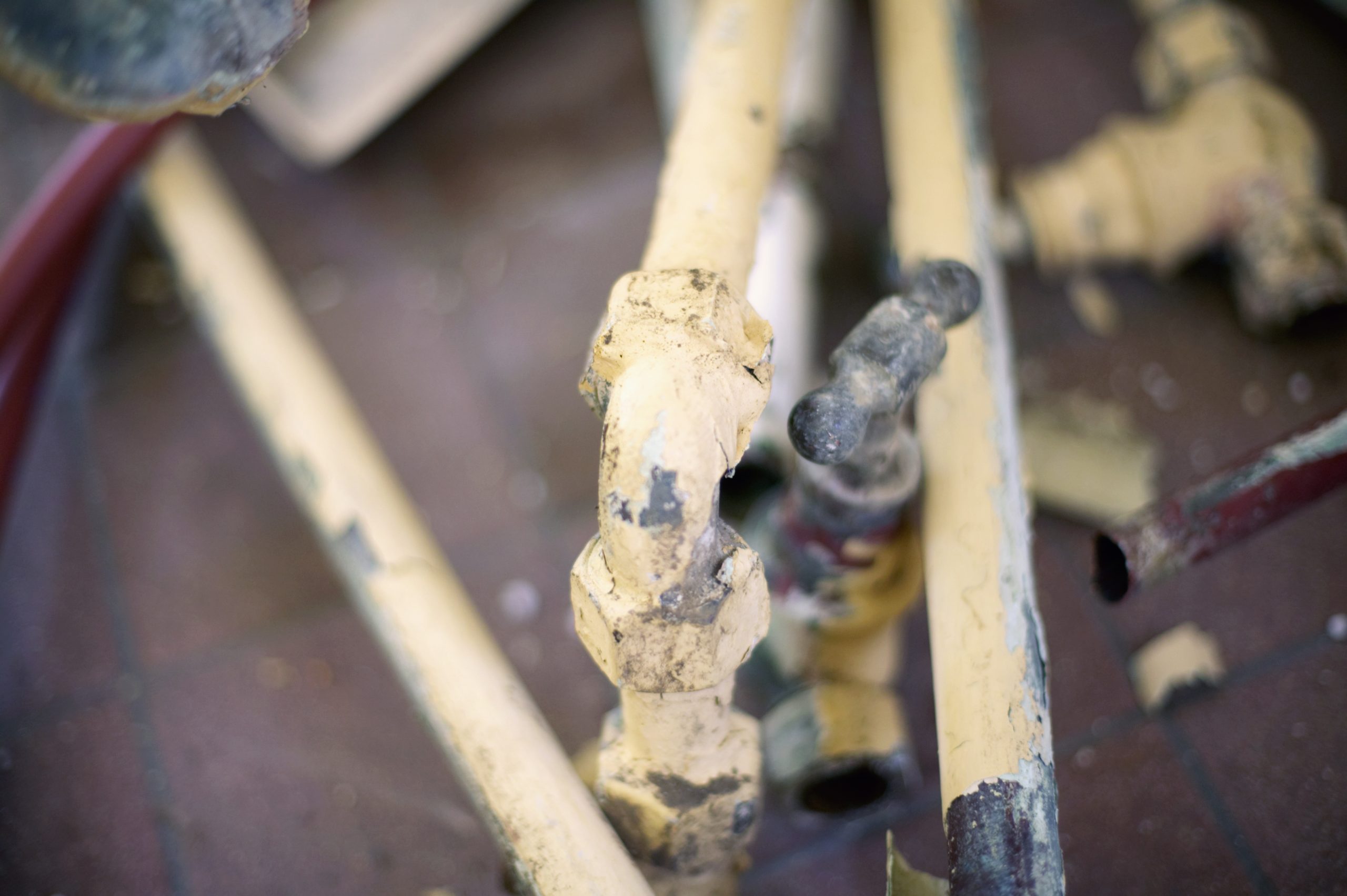 abstract view of pipes with chipped paint 2026 01 11 09 49 01 utc
